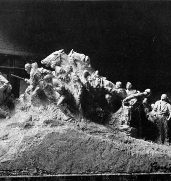 Wars of America sculptural model with warriors and horses advancing across textured terrain.
