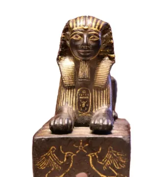 Thutmose III sphinx with a dark body and gold detailing on the headdress, beard, and collar