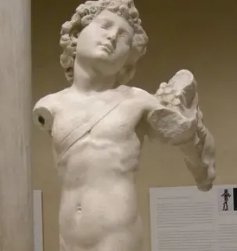 Marble Young Archer statue of a nude youthful male figure with curly hair, missing parts of its arms and legs.