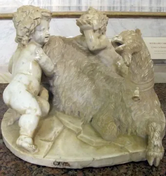 The Goat Amalthea marble sculpture with a shaggy goat and two cherubic figures