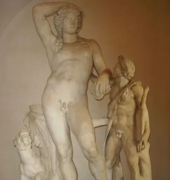 Ludovisi Dionysus marble sculpture showing Dionysus beside a smaller satyr and a panther at their feet.