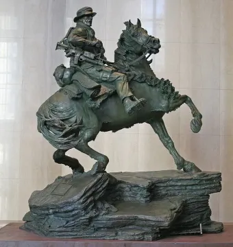 America\'s Response Monument bronze horse soldier statue on a rock-like base