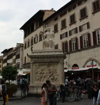 Giovanni delle Bande Nere statue seated in classical armor on an ornate pedestal