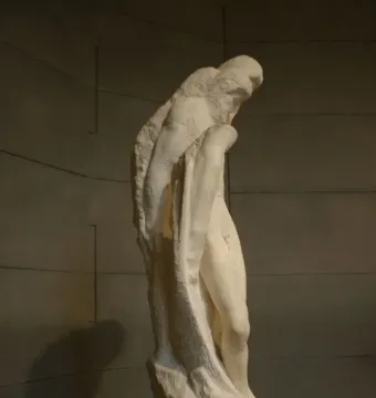 Rondanini Pietà, a tall unfinished white marble sculpture with elongated intertwined figures on a stone pedestal.