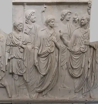 Cancelleria Reliefs marble frieze with draped figures, including several damaged and headless figures.