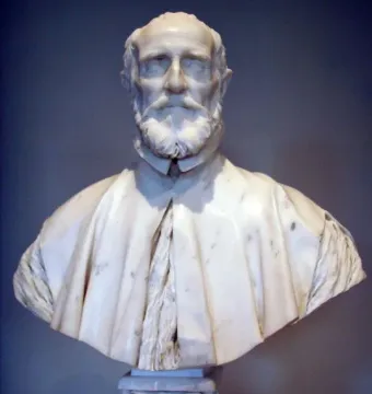 Marble bust of Francesco Barberini with a full beard, wearing a draped cape and collared garment, on an ornate pedestal.