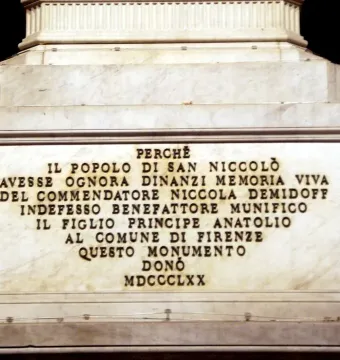 Inscribed marble plaque on the Monument to Nicola Demidoff with dark carved lettering and the year MDCCCLXX.