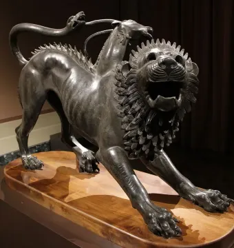 Bronze Chimera of Arezzo with a lion’s body, a goat’s head on its back, and a raised snake tail.