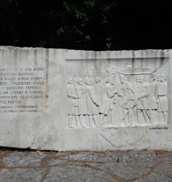 Keys Handover Memorial stone relief with figures and Cyrillic inscription