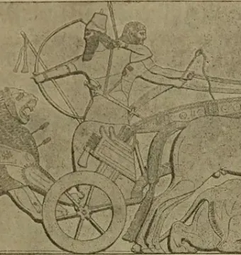 Lion Hunt of Ashurbanipal relief showing a horse-drawn chariot, archers, and lions in a hunting scene.