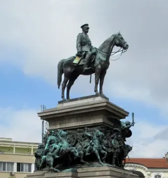 The Tsar Liberator Monument shows a green-patinated bronze equestrian statue on a tall stone pedestal with battle reliefs.