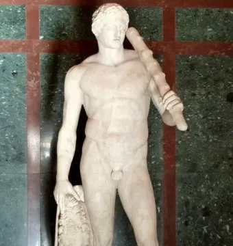 Lansdowne Heracles, a nude marble statue of a muscular beardless man holding a club and lion skin.