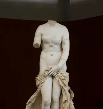Venus Landolina, a headless marble female statue with one arm missing and drapery covering the lower body.