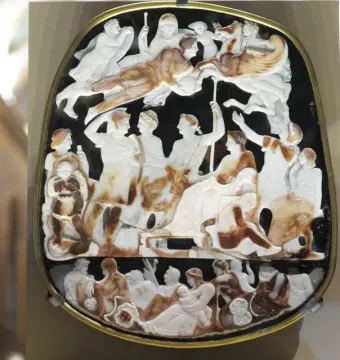 Great Cameo of France in a gold frame, showing carved classical figures arranged in three horizontal levels.
