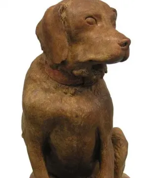 Cane Tago, a seated terracotta dog sculpture on a rectangular base, facing right.