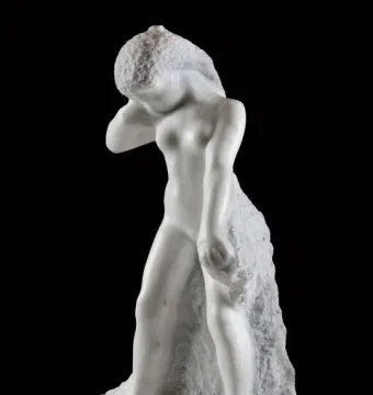 Standing Fauness, a white marble sculpture of a nude female figure with her head bowed and one arm raised.