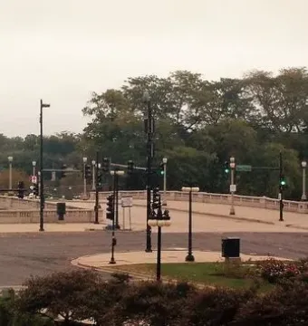 The Bowman and The Spearman bronze equestrian statues on pedestals flanking a roadway.