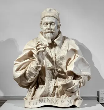 Bernini’s marble bust of Pope Clement X with a raised right hand and a book in the left hand