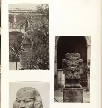 Coatlicue stone statue with a skirt of serpents, skull and heart motifs on the torso, and twin serpent heads at the top.