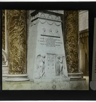 Monument to the Royal Stuarts, a large marble funerary monument with three busts, an inscription panel, and winged figures at the base.