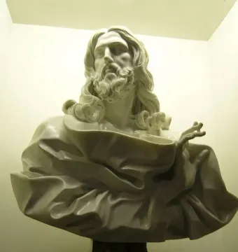 Bust of the Saviour, a white marble bust of a bearded man with long wavy hair and draped robes, gazing upward.