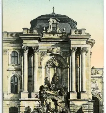 Fountain of King Matthias with sculptural figures set before a grand classical facade in Budapest.