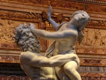 The Rape of Proserpina marble sculpture showing a bearded man lifting a smaller female figure in a dramatic pose.