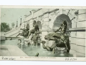 Court of Neptune Fountain with dark metallic statues rising from a pool beside stone arches and steps.