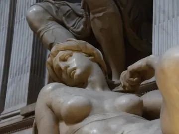 Michelangelo’s Dawn, a reclining marble female figure with tilted head and visible torso