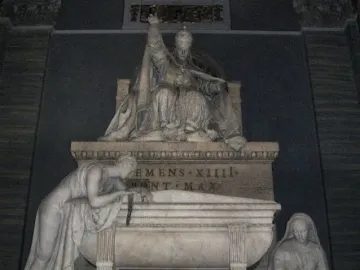 Tomb of Pope Clement XIV by Antonio Canova, showing a seated pope above two draped female figures and a sarcophagus