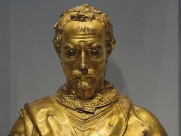 Saint Rossore Reliquary, a gold-toned bust of a bearded man with ornate hair and draped clothing.