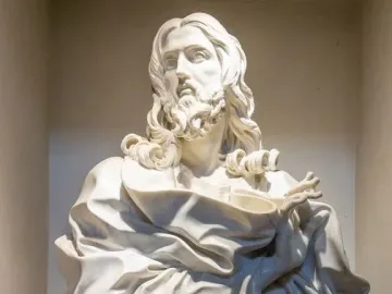 Bust of the Saviour, a white marble bust of a bearded man with long wavy hair, shown on a tiered pedestal.