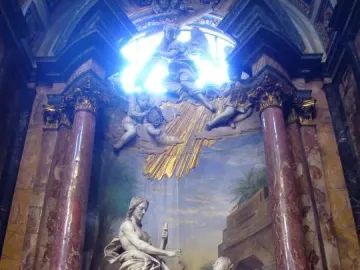 Noli Me Tangere marble sculpture of a cloaked man recoiling from a kneeling woman inside an ornate church interior.