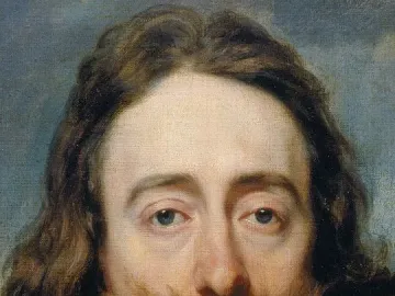 Bust of King Charles I with long wavy hair, a mustache, and a pointed goatee, wearing a lace collar.