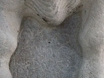 Close-up of the Çineköy inscription carved into a weathered stone surface.