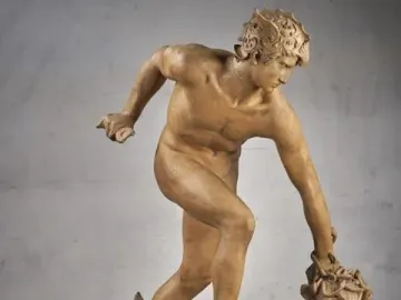 Perseus and the Gorgon sculpture showing a nude winged Perseus standing over Medusa with snake-like hair.