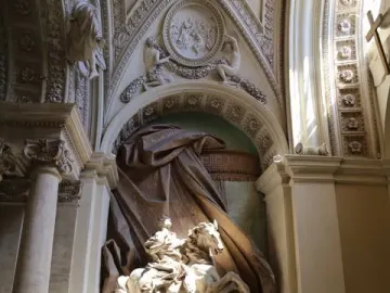 The Vision of Constantine, a white marble equestrian statue of a rearing horse framed by ornate architecture and dark drapery.