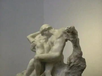 The Eternal Springtime marble sculpture of a nude man and woman in an intimate embrace