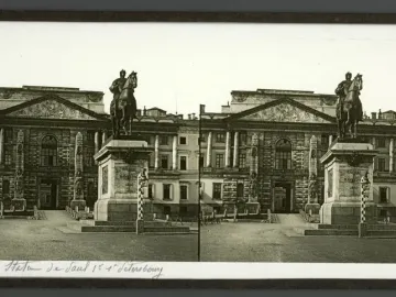 Monument to Peter I on a tall stone pedestal in front of St. Michael\'s Castle in Saint Petersburg.