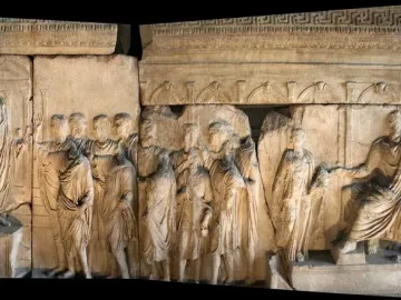 Plutei of Trajan marble relief with carved Roman figures and a seated central figure framed by classical architecture.