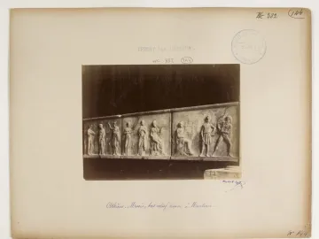 Mantineia Base with three carved relief panels showing classical figures, including a lyre player.