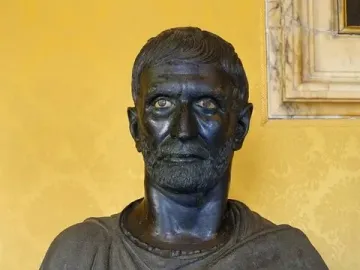 Capitoline Brutus bronze bust with inlaid eyes and draped shoulders