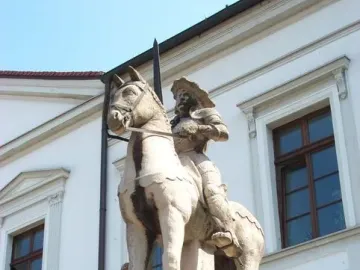 Haldensleben Roland stone equestrian statue on a pedestal in front of a building