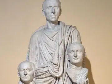 Togatus Barberini, a marble statue of a standing man in flowing robes holding two sculpted heads.