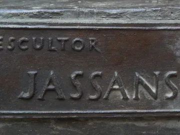 Bronze plaque on A Lluís Millet with raised lettering reading \
