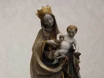 Beautiful Madonna of Wrocław statue of a crowned woman holding a child