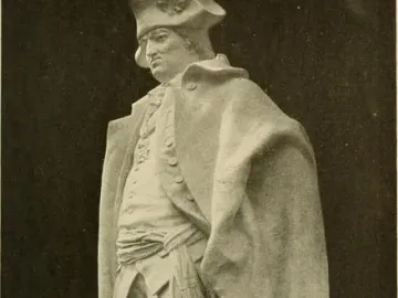Full-length statue of Major General Friedrich Wilhelm von Steuben in a tricorn hat, cloak, and military coat on a stone base.
