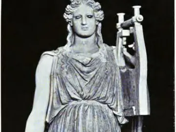 Apollo Barberini, a light-colored stone statue of a standing figure holding a lyre-like instrument and a small object.