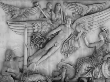 Relief on the Antoninus Pius Column showing a winged figure rising between eagles, surrounded by draped and seated classical figures.