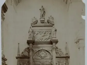 Sepia-toned view of the Tomb of Lew Sapieha, a multi-tiered funerary monument with sculptural figures, reliefs, coats of arms, and inscription plaques.